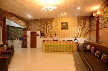 Lobby with tribal art and warm tones